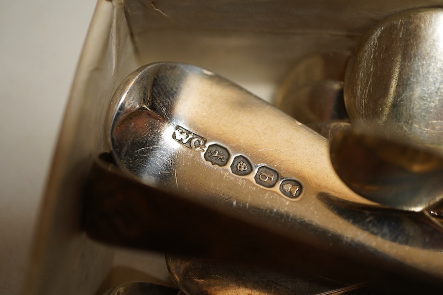 A set of six William IV silver fiddle pattern dessert spoons, London, 1831, William Chawner II, initialled P togerther with assorted 19th century fiddle pattern and a pair of sugar tongs, weight approx. 16.33ozt (qty)